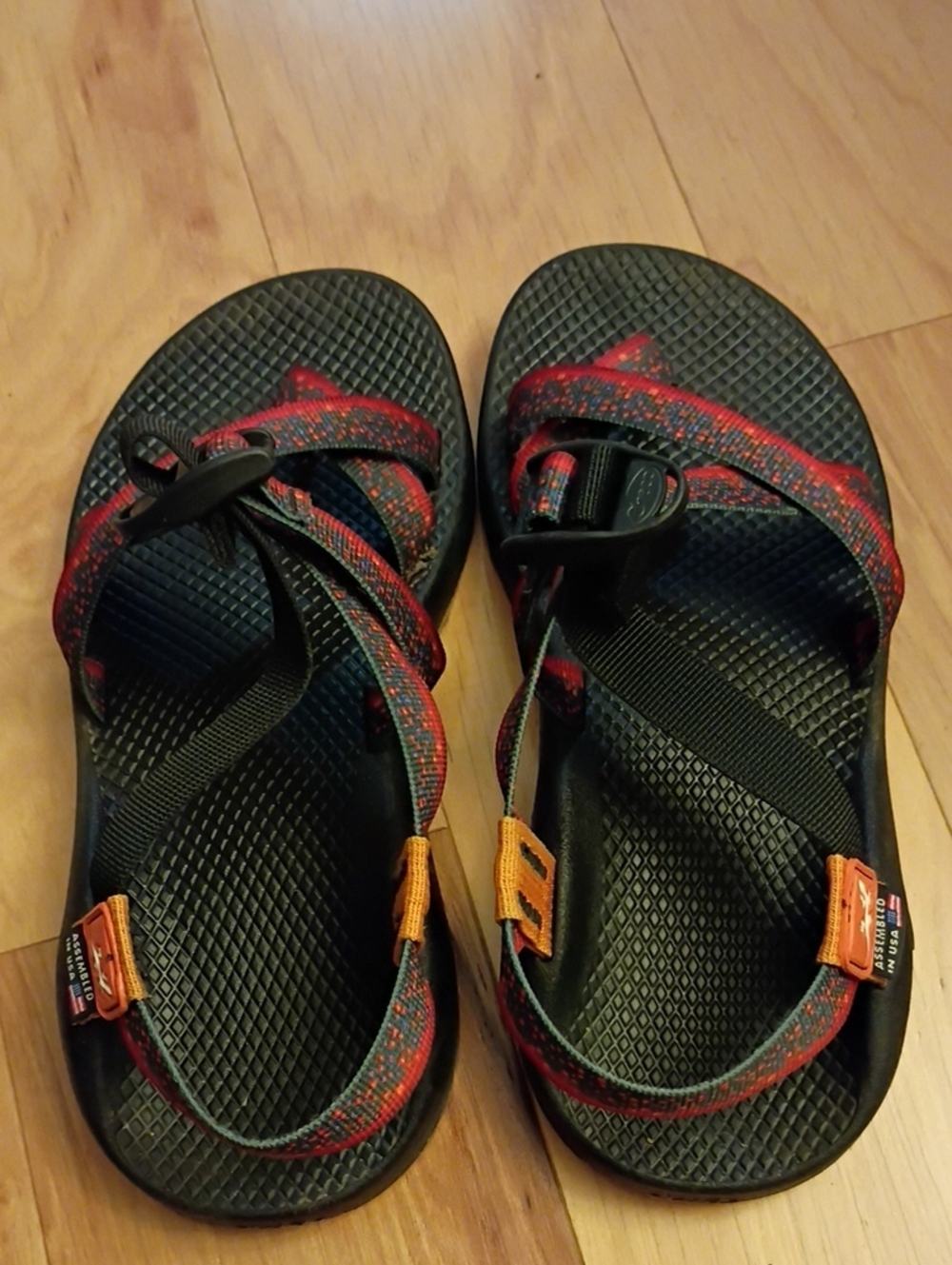 Chaco Women's Black Sandals with Red and Orange Strap Accents